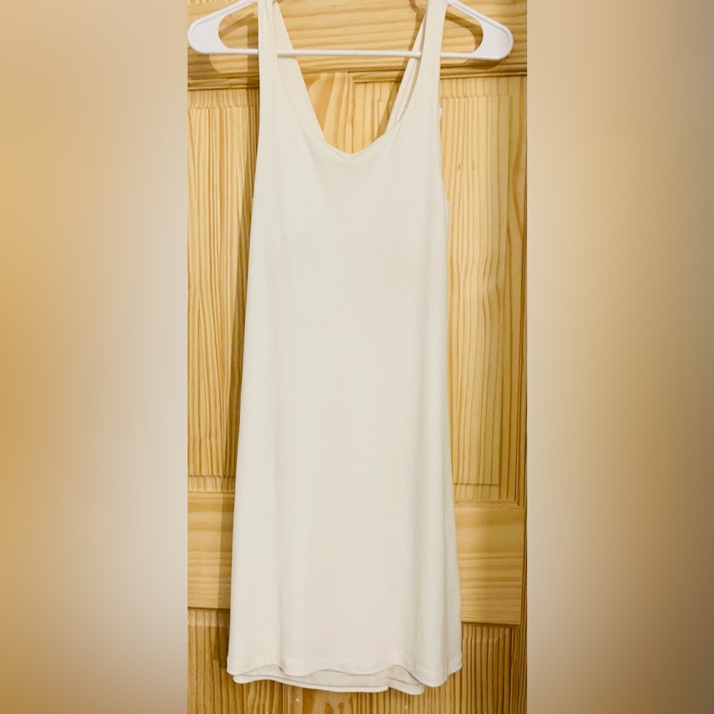 Elegant Cream Sleeveless Dress - Picture 9 of 11